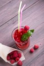 Glass of fresh strawberry smoothie and fresh strawberries on pink wooden background. Healthy food and drink concept Royalty Free Stock Photo