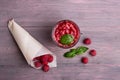 Glass of fresh strawberry smoothie and fresh strawberries on pink wooden background. Healthy food and drink concept Royalty Free Stock Photo