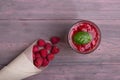 Glass of fresh strawberry smoothie and fresh strawberries on pink wooden background. Healthy food and drink concept Royalty Free Stock Photo