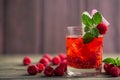 Glass of fresh strawberry smoothie and fresh strawberries on pink wooden background. Healthy food and drink concept Royalty Free Stock Photo