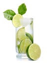 Glass of fresh tonic with lime fruits isolated