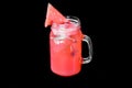 Glass of fresh watermelon juice with ice isolated on black background Royalty Free Stock Photo