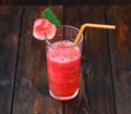 Glass of fresh watermelon smoothie, cocktail on wooden background Royalty Free Stock Photo