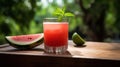 Glass of freshly made watermelon juice with lime and mint, generative ai