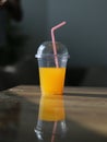 Glass full of drink placed on wooden table Summer photography shoot concept