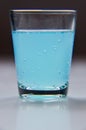 A glass of full kamikaze transparent blue drink Royalty Free Stock Photo