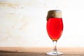 A glass of red beer on a wooden table, copy space Royalty Free Stock Photo