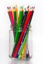 Glass full of sharpened wooden color pencils Royalty Free Stock Photo
