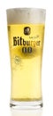 Glass of German non-alcoholic Bitburger lemon beer isolated on white Royalty Free Stock Photo