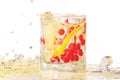 Glass of gin, ice, lemon and cranberry with splash Royalty Free Stock Photo