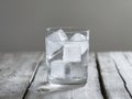 Glass gin tonic wooden table is filled ice A Royalty Free Stock Photo