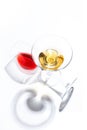 Glass glasses with drinks of different colors on a white background. Top view. The concept of an alcoholic cocktail Royalty Free Stock Photo