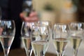 Glass glasses with prosecco - setting up the glasses on the table in the restaurant for an aperitif