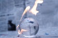 Glass globe on fire. Planet Earth Burning. Global Warming and Climate Change Concept Royalty Free Stock Photo