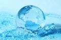 Glass globe in water Royalty Free Stock Photo