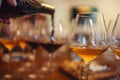 Glass goblets placed in rows on table during wine tasting procedure in restaurant