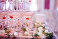 Glass goblets. Pyramid of champagne. The hill glasses wine and cherries. for alcohol. Festive drink. Bartender show Royalty Free Stock Photo