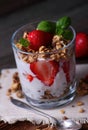 Glass with granola and strawberries