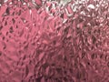 glass granules with pink, dirty, textured background