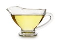 Glass gravy boat with sunflower oil isolated Royalty Free Stock Photo