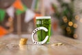 Glass of green beer, horseshoe and gold coins Royalty Free Stock Photo