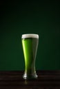 glass of green beer on table st patricks