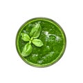 Glass of green smoothie decorated with basil leaves, isolated over white with clipping path. Top view Royalty Free Stock Photo