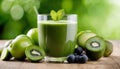 A glass of green smoothie with kiwi and blueberries Royalty Free Stock Photo