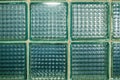 Glass green square tile wall background, finishing material Royalty Free Stock Photo