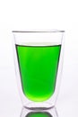 Glass of green water made by food color Royalty Free Stock Photo