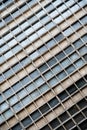 Glass grey square Windows of modern city business building skyscraper. Glass balconies in the building. Modern apartment buildings Royalty Free Stock Photo