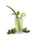 Glass of healthy aloe cocktail with cucumber and parsley on white background