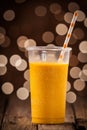 Glass Of Healthy Orange Mango Smoothie