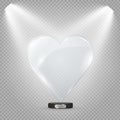 Glass heart on a transparent background, illustration. Spotlight illuminating the heart.