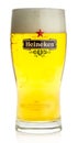 Glass of Heineken Pilsener beer Royalty Free Stock Photo