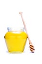 Glass of honey and dipper Royalty Free Stock Photo