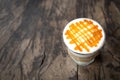 Glass of hot caramel macchiato coffee Royalty Free Stock Photo