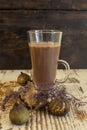 A glass of hot chocolate with fruit decorated Royalty Free Stock Photo