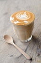 A glass of hot latte art coffee Royalty Free Stock Photo