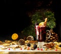 Glass of hot mulled wine for the new year with ingredients for c Royalty Free Stock Photo