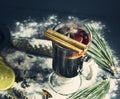 Glass hot Mulled wine with sticks of cinnamon, anise, lemon Royalty Free Stock Photo