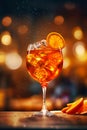 Glass of ice cold Aperol spritz cocktail served in a wine glass, decorated with slices of orange Royalty Free Stock Photo