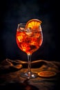 Glass of ice cold Aperol spritz cocktail served in a wine glass, decorated with slices of orange Royalty Free Stock Photo