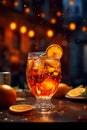 Glass of ice cold Aperol spritz cocktail served in a wine glass, decorated with slices of orange Royalty Free Stock Photo