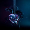 Glass, ice, heart on a dark background. Symbol of love and indifference Royalty Free Stock Photo