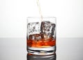 glass with ice and liquor splash Royalty Free Stock Photo