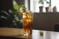 A glass of iced tea made of a lemon wedge and a sprig of mint.Â  Royalty Free Stock Photo