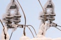 Glass insulator on the power line. Insulator of electrical high-voltage lines