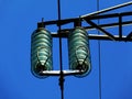 Glass Electrical Isolators and Powerlines Royalty Free Stock Photo