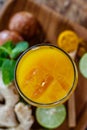 A glass of Jamu `Kunir Asam`, traditional Indonesian herbal tonic medicine